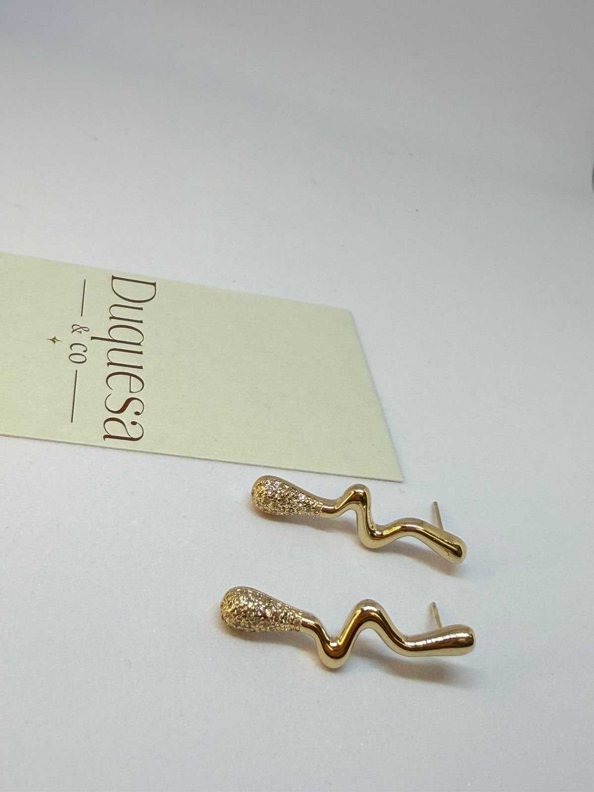 Brinco Fluxo Dourado