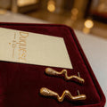 Brinco Fluxo Dourado